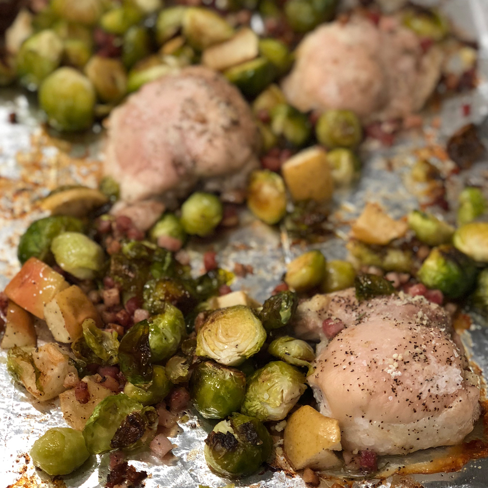 <p>Here's a real time-saver for weeknights, an easy sheet-pan dinner of chicken thighs, apples, pancetta, and Brussels sprouts tossed in olive oil and herbs. "If you're looking for the easiest dinner imaginable, sheet pan recipes are the perfect thing for you," says My Stir Crazy Kitchen. "This one is not only easy to cook, but even easier to clean! Serve it alone or with rice/salad."</p>
                          