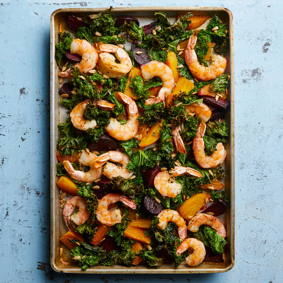 <p>For this easy sheet-pan dinner, beets get a head start in the oven while you prep the shrimp and kale. For a prettier presentation, leave the shrimp tails intact. Serve this one-pan recipe with a cool glass of ros&eacute;.</p>
                          