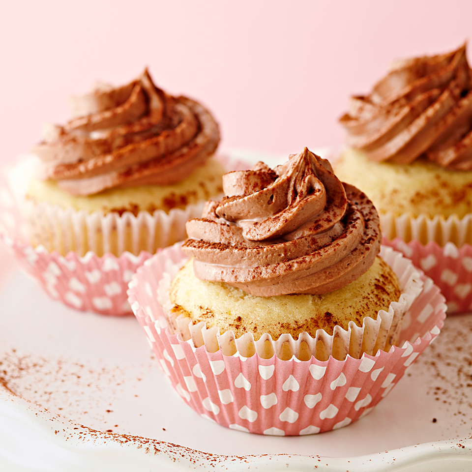 <p>Light, sweet vanilla cupcakes topped with chocolate cream-cheese frosting will be a hit with your family.</p>
                          