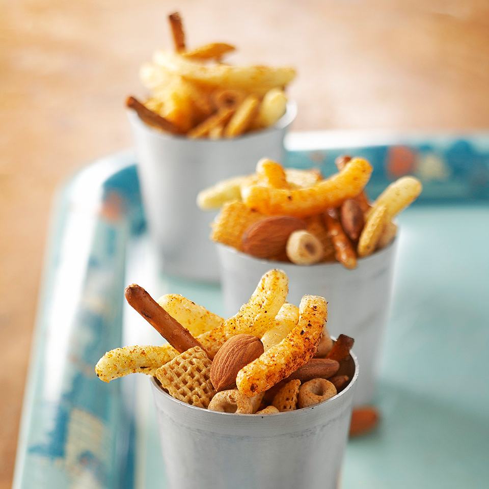 <p>Serve your guests a crunchy snack mix seasoned with sweet-and-spicy flavors. It mixes up fast and adds a festive note to any gathering.</p>
                          