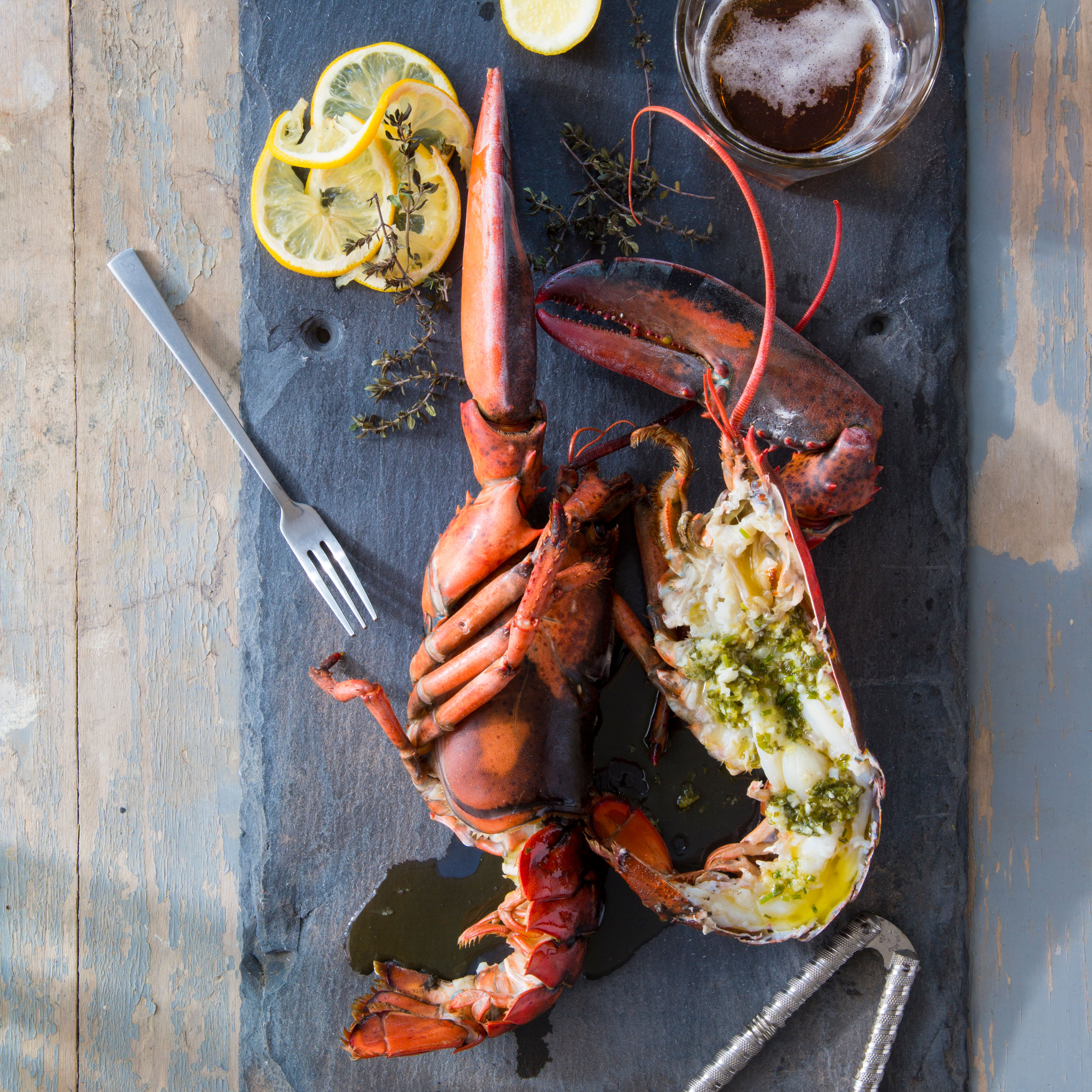 <p>If you've never grilled lobster, you're in for a treat. The smokiness of a charcoal, wood or even a gas grill adds great flavor. If you are squeamish about the idea of cutting a live lobster, ask your fishmonger to do it for you, but be sure to cook the lobsters within about an hour after they have been cut.</p>
                          