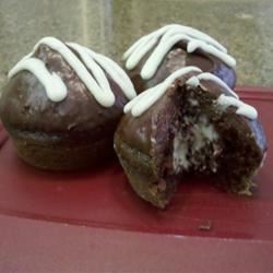 Chocolate Cream-Filled Cupcakes with Fudge Icing sphinxriddle