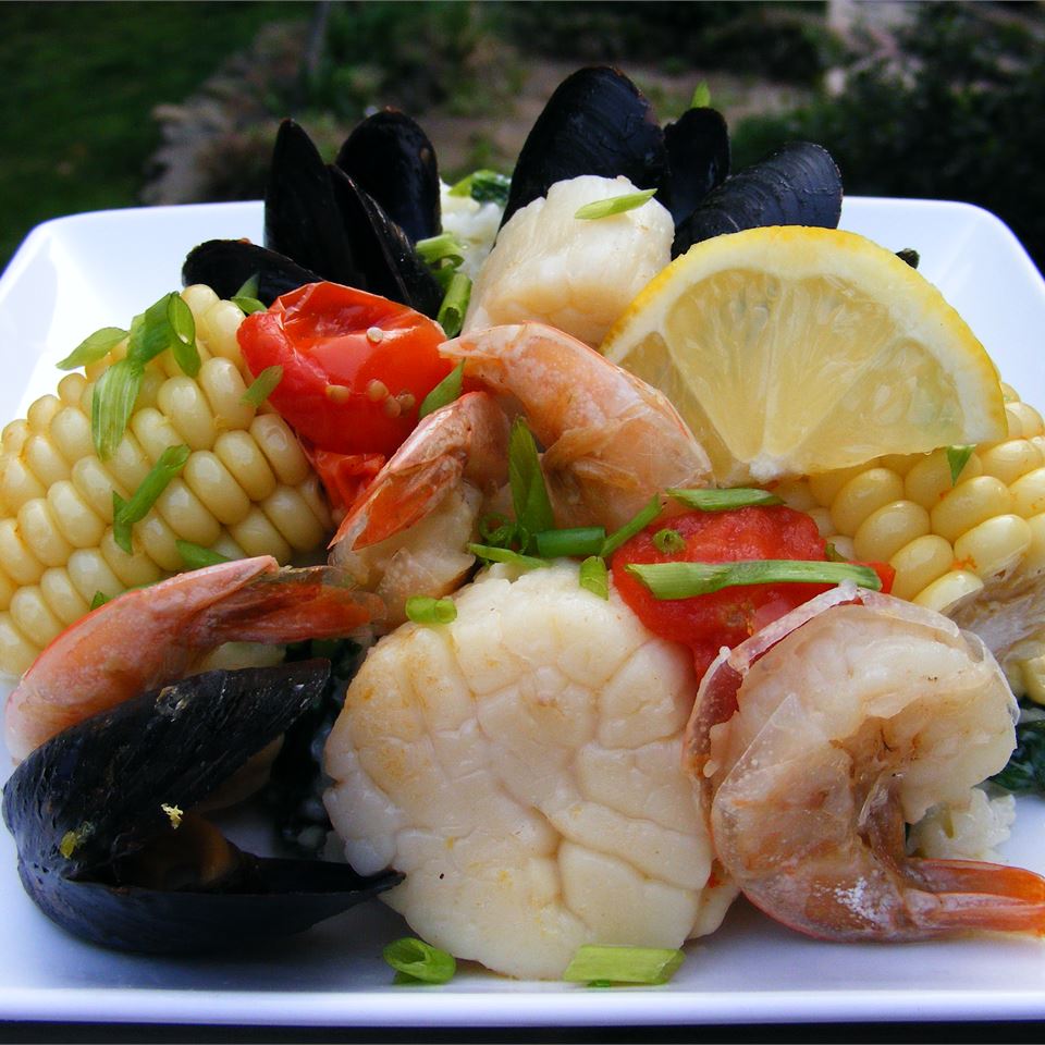 <p>Think of this as a grilled version of a seafood boil, with foil packets filled with a variety of seafood plus corn and cherry tomatoes. Use whatever seafood you like &mdash; scallops, shrimp, clams, mussels &mdash; just adjust cook time accordingly. Cookin'mama says, "This would be an excellent meal for company because it can all be made ahead of time and then just thrown on the grill."</p>
                          