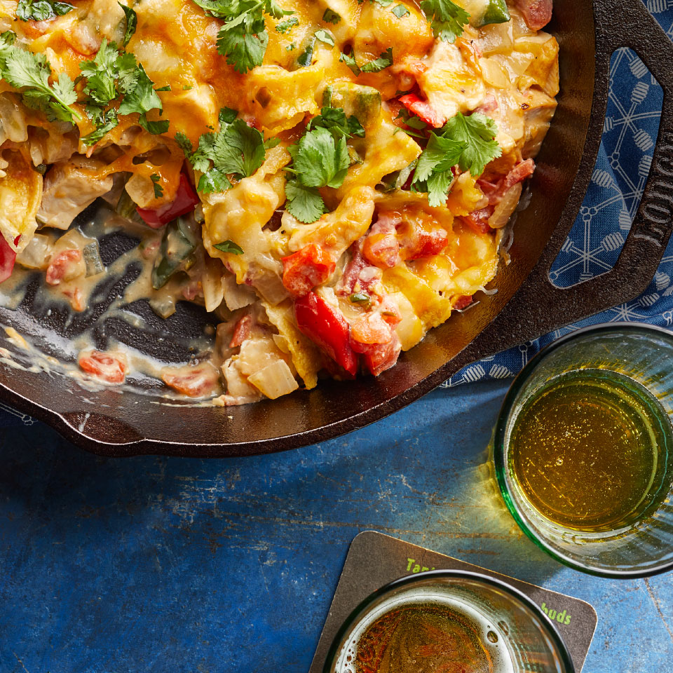 <p>Usually made by layering creamy chicken and tortillas (lasagna-style), this classic Tex-Mex chicken casserole gets speedier for an easy weeknight dinner when we mix everything together in a skillet, then pop the whole pan under the broiler to make the cheese topping gooey.</p>
                          