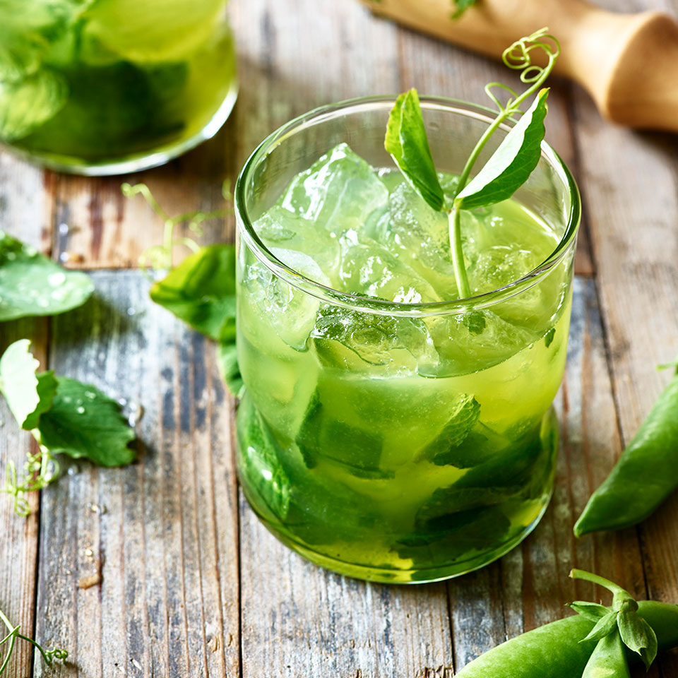 <p>This play on the Derby Day favorite the mint julep uses the whole sugar snap pea plant: pea greens in the simple syrup and snap pea "juice," plus pea blossoms for garnish, if you're lucky enough to find them.</p>
                          