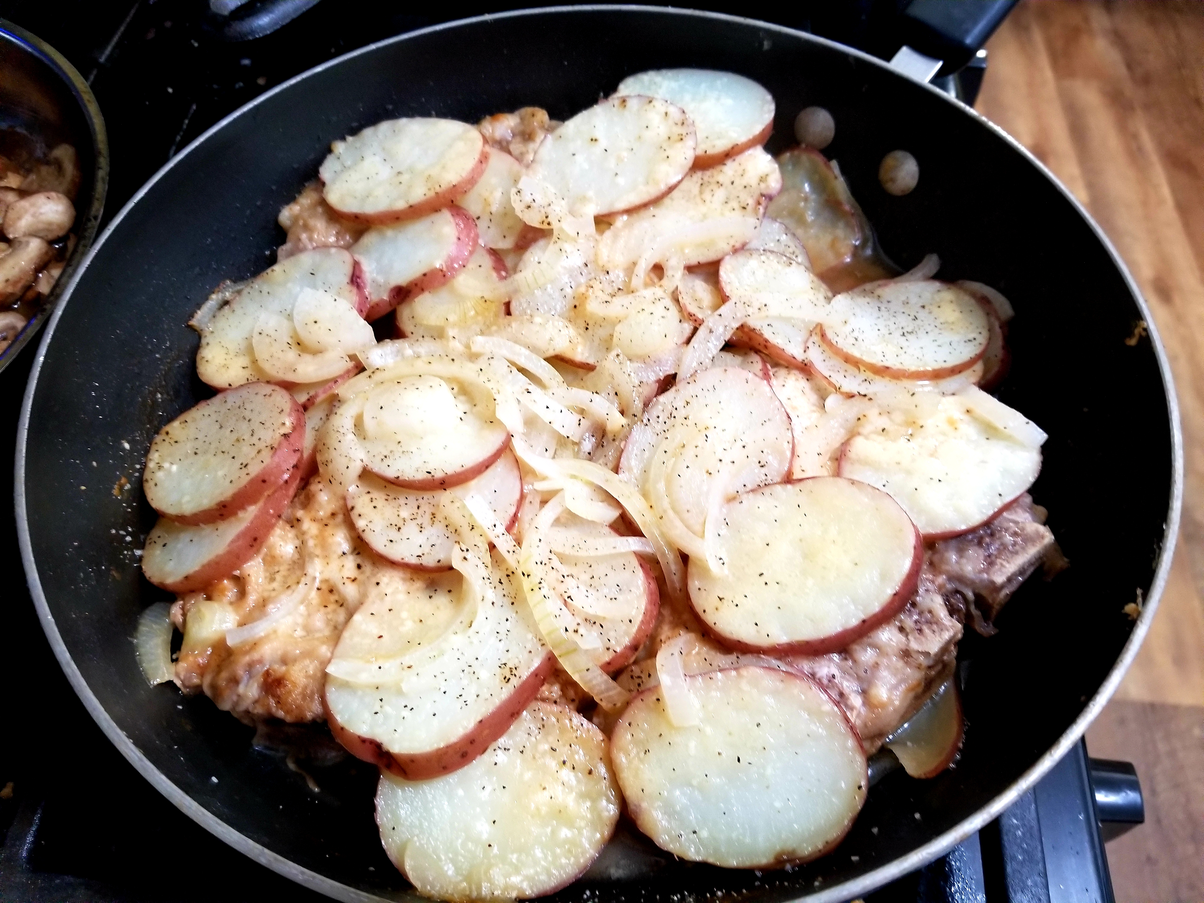 Skillet Pork Chops with Potatoes and Onion Amanda Tucker