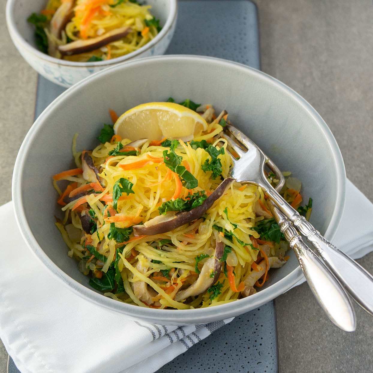<p>Umami-rich shiitake mushrooms take the place of meat, and spaghetti squash strands stand in for the traditional rice noodles, in this riff on the classic Filipino noodle dish pancit bihon. Serve alongside your favorite vegan main or add some cubed tofu to make it a meal.</p>
                          