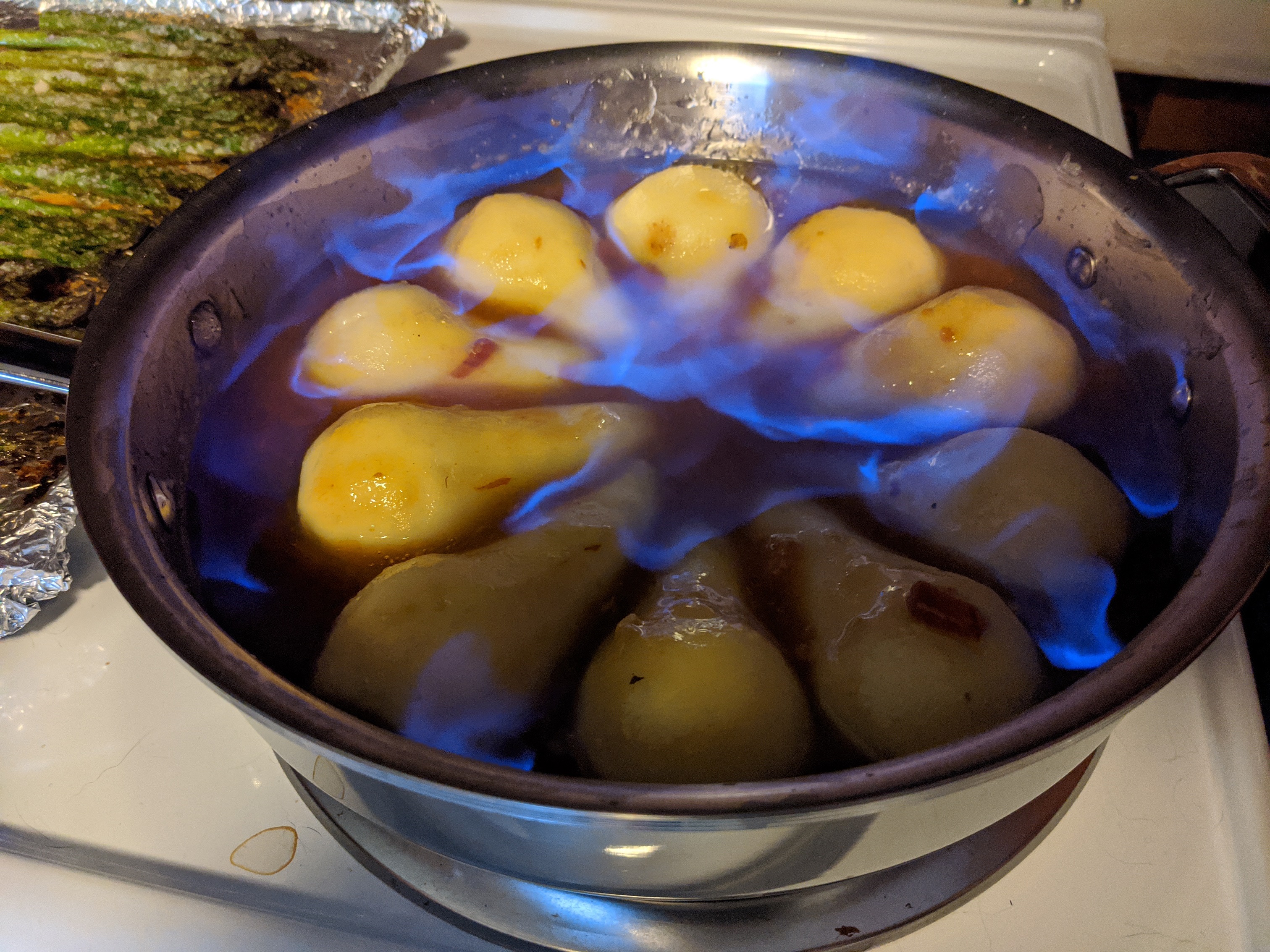 Flambeed Vanilla-Poached Pears with Apricot Sauce Scott M.