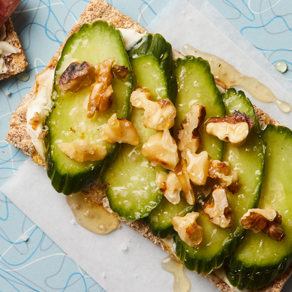 <p>This smørrebrød--the Danish name for an open-faced sandwich served on rye--is reminiscent of a cucumber tea sandwich, with a drizzle of honey for sweetness and walnuts for crunch.</p>
                          