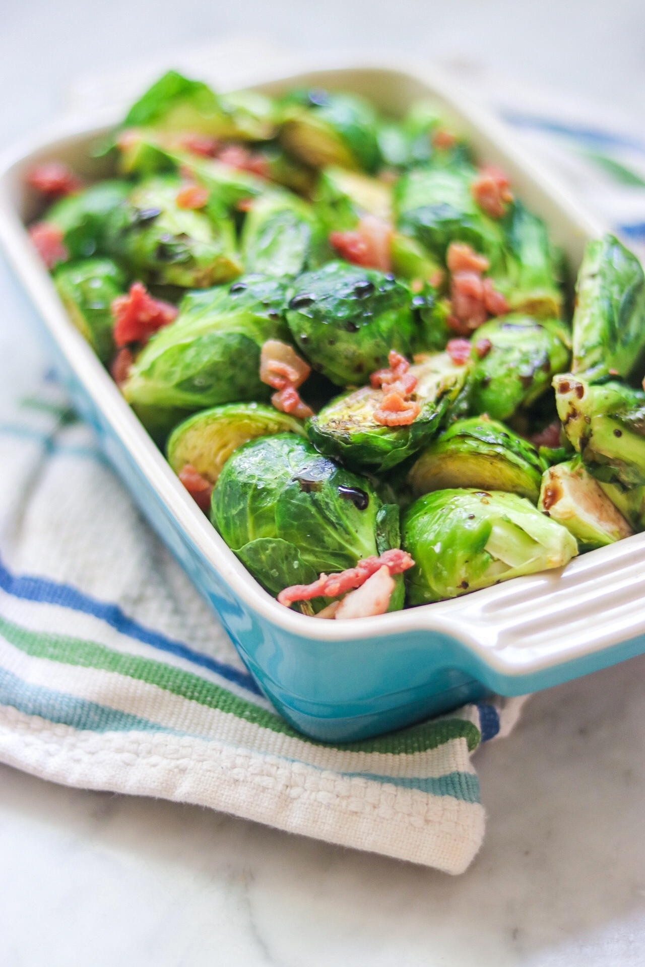 <p>"Sweet and tart balsamic vinegar pairs well with the bitterness of Brussels sprouts; the bacon adds a smokey flavor," says Bren. "After 10 minutes, there's still some bite to the sprouts; add a few more minutes for a softer texture, if desired."</p>
                          