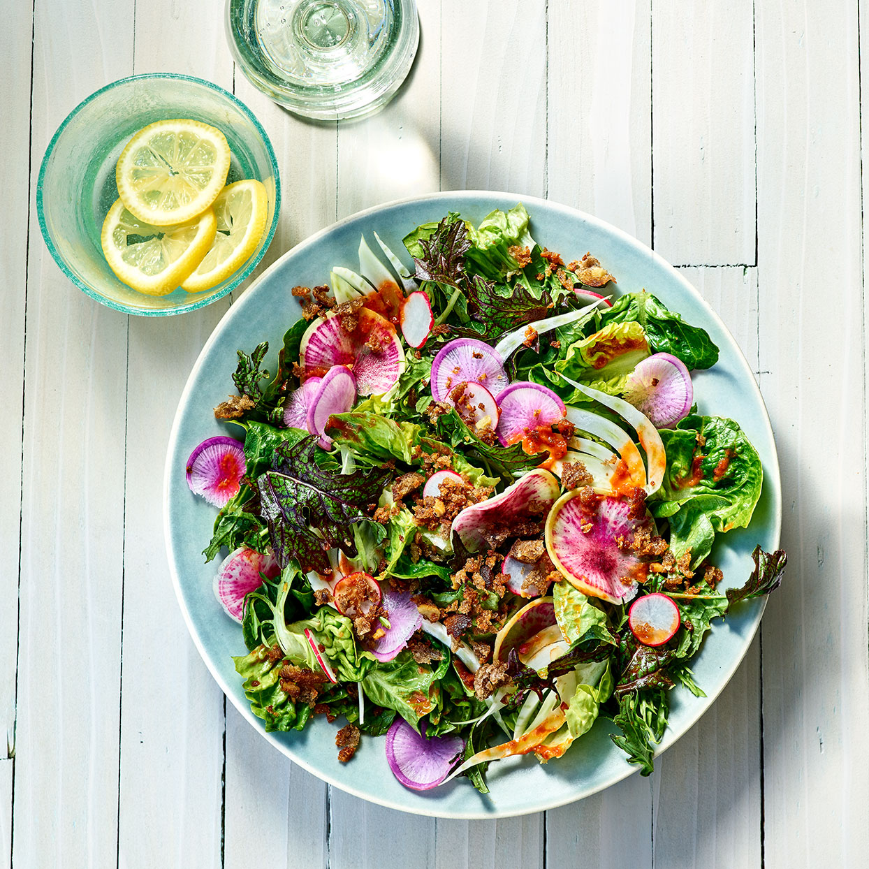 <p>Using a variety of greens gives this simple summer salad an interesting mix of textures. The anchovy in the breadcrumbs and sun-dried tomatoes in the vinaigrette are subtle, but key to adding umami.</p>
                          