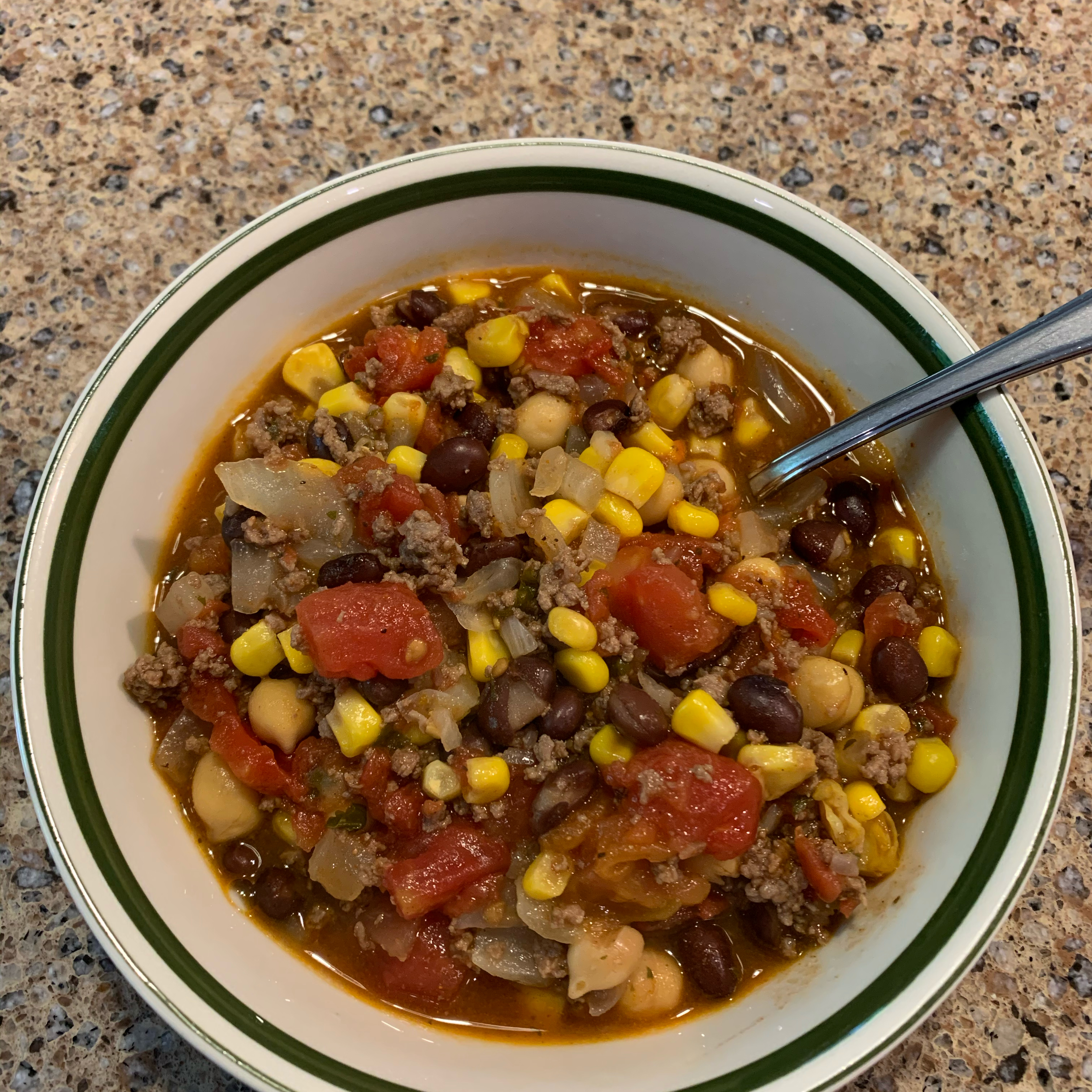 <p>Stock up the pantry for this super-quick soup, featuring browned ground beef, crushed tomatoes, pinto beans, corn, black beans, diced tomatoes and green chiles, black olives, seasoned with ranch dressing mix and taco seasoning. "This thick and hearty taco soup comes together in a flash," says Soup Loving Nicole. "The subtle hint of ranch sets it apart from your average taco soup. Garnish with chopped cilantro if desired."</p>
                          