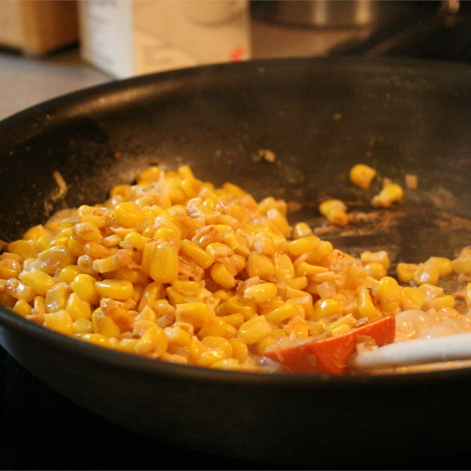 <p>"This is one of the most popular corn dishes during Thanksgiving," says AGALL. "It is not your traditional boring old corn. This recipe includes butter, cream and shallots. I always get rave reviews when I make this."</p>
                          