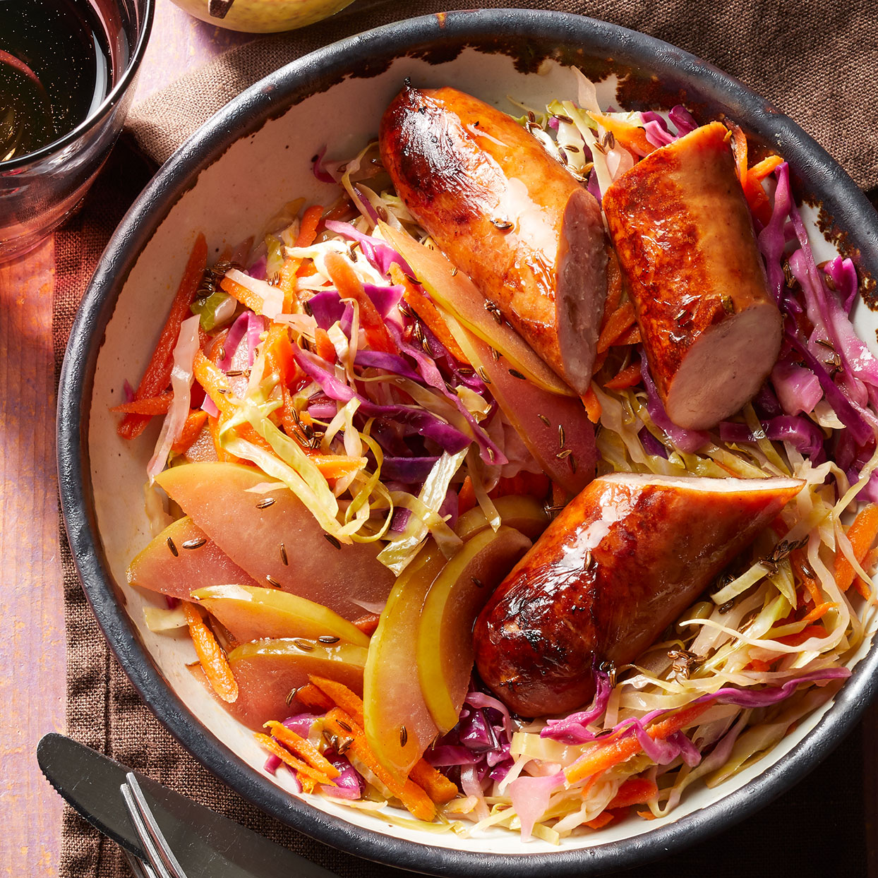 <p>This colorful cabbage sauté is the best of both sauerkraut and slaw--a mix of textures and bright, tangy flavor. Serve with assorted mustards and some toasted rye bread.</p>
                          