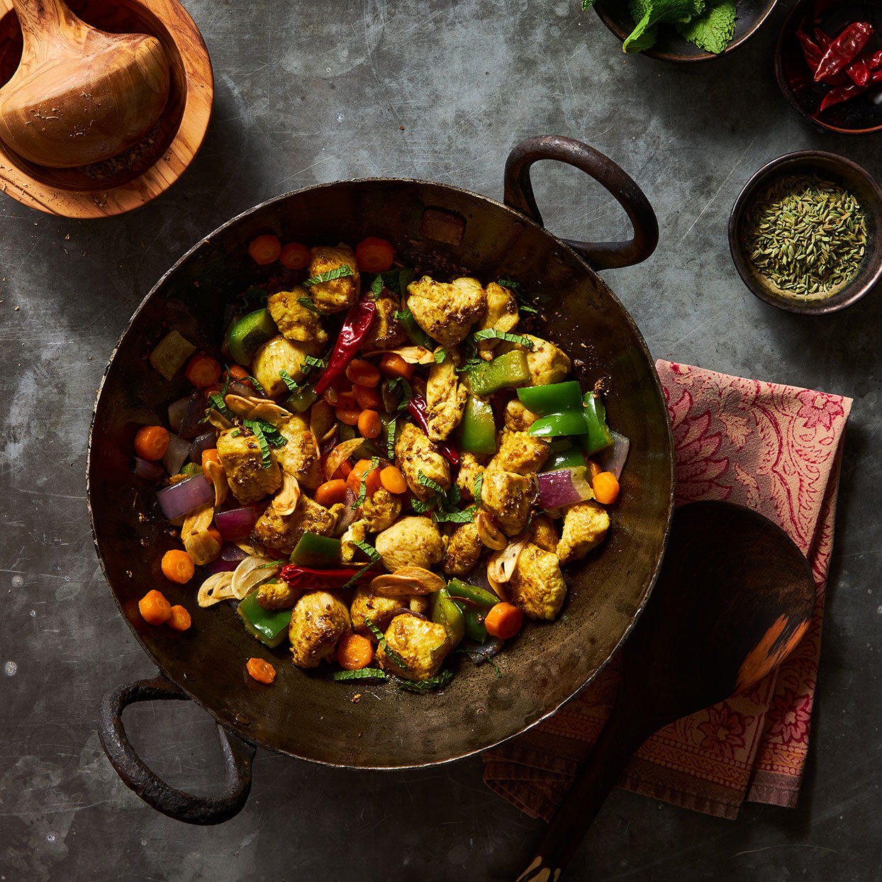 <p>This stir-fry is typical of Northern Indian cuisine, with its emphasis on fresh vegetables. Because the cooking happens quickly it's a good idea to measure out and prepare all the ingredients in this recipe before you fire up the wok.</p>
                          