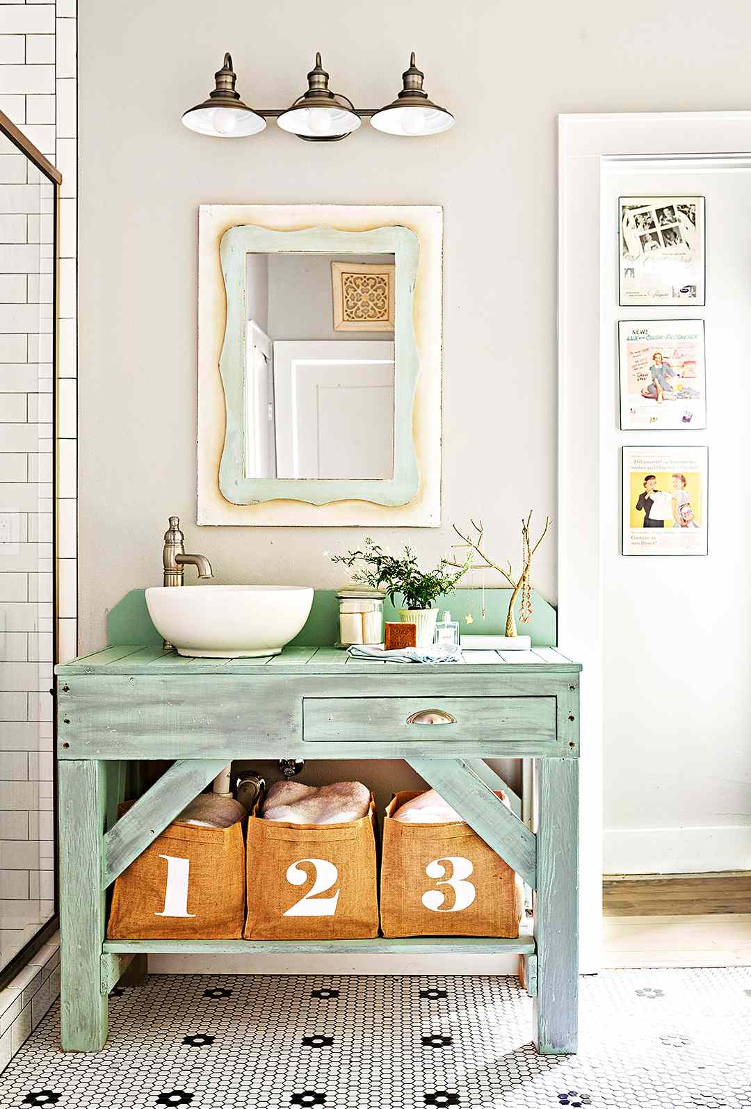 diy rustic green bathroom vanity with bumbered baskets and mirror