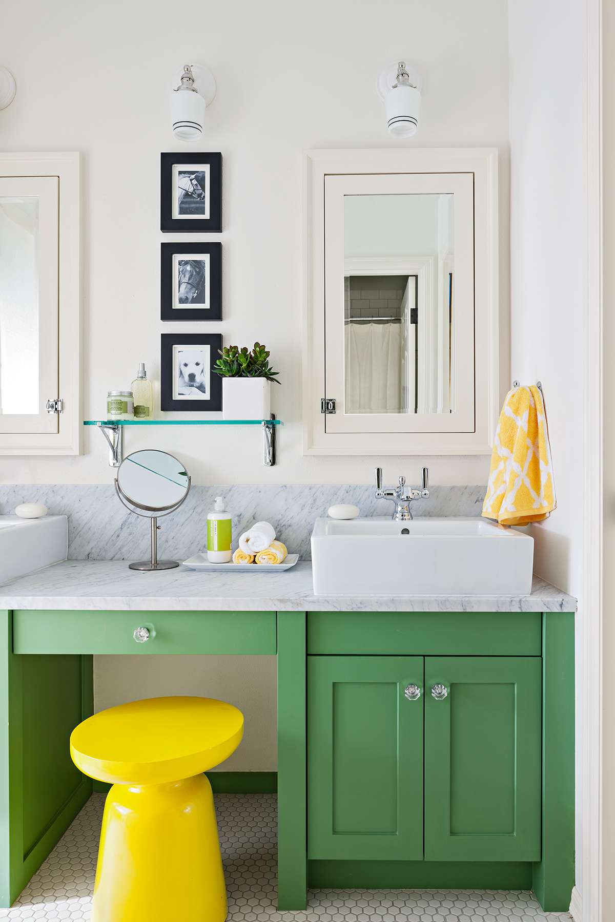 green bathroom vanity with bright yellow stool