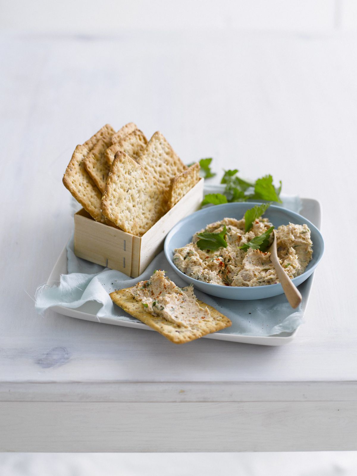 Canned tuna on whole-wheat crackers