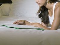 woman-bed-reading-no-sleep
