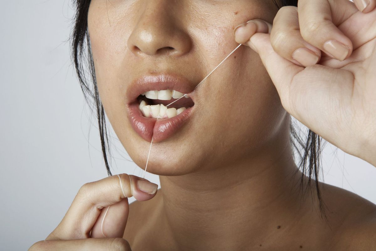 Report says flossing your teeth is pointless