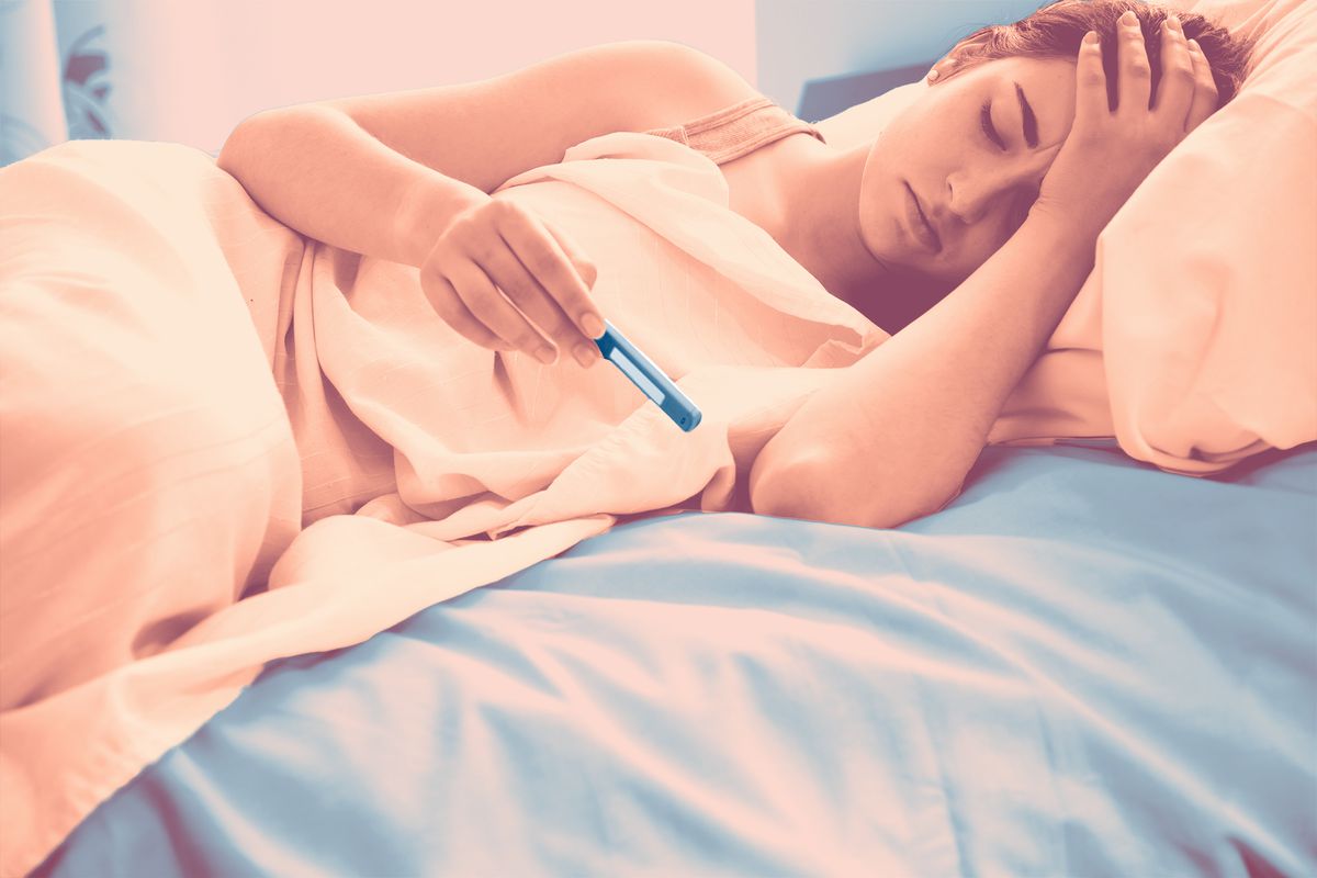 cytomegalovirus symptoms , Woman Checking Her Temperature in Bed