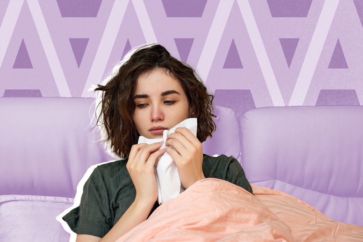 CDC Investigating H3N2 Flu Cases on Michigan Campus—What to Know about Influenza A , sick woman sneezing and covering nose with paper napkin, close-up