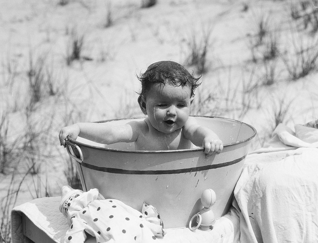 Baby sitting in tub