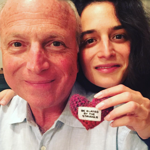 Father and daughter Ron and Jenny Slate with handmade cloth heart