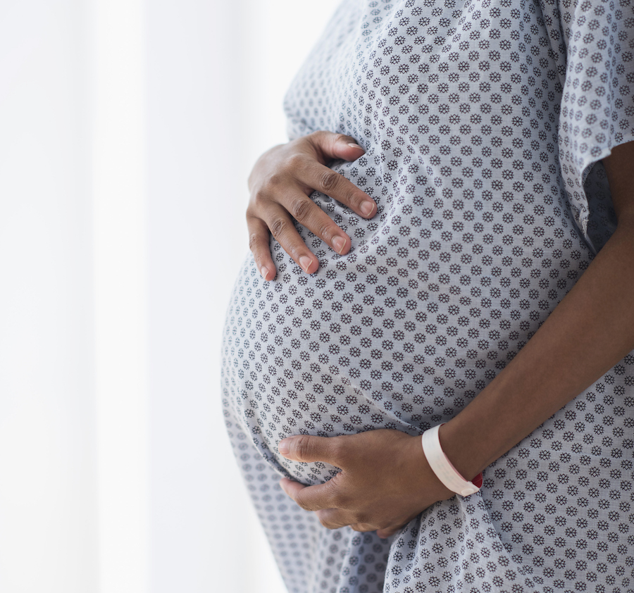 Black woman pregnant in hospital