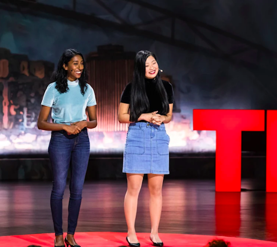 Priya Vulchi and Winona Guo presenting a TEDTalk