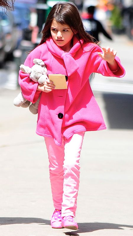 Suri Cruise in pink coat