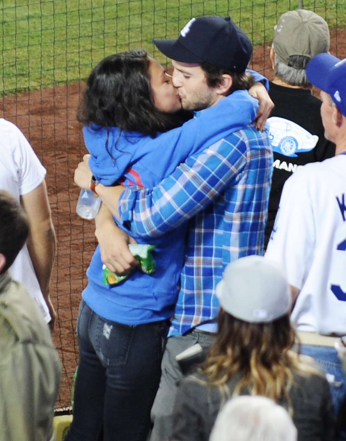 EXCLUSIVE: **PREMIUM EXCLUSIVE RATES APPLY** STRICTLY NO WEB UNTIL 130PM PST SEPTEMBER 3rd 2015**  Mila Kunis and Ashton Kutcher kiss while celebrating a home run at Dodgers baseball game