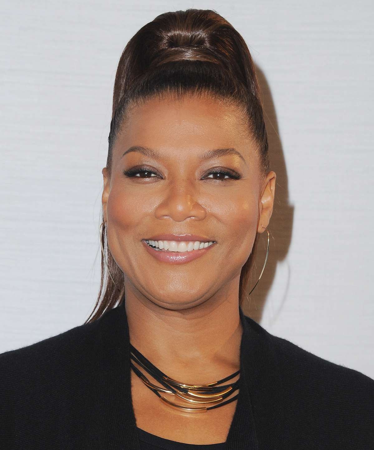 Actress Queen Latifah arrives at Sony Pictures Releasing's 'Miracles From Heaven' Photo Call at The London Hotel on March 4, 2016 in West Hollywood, California.