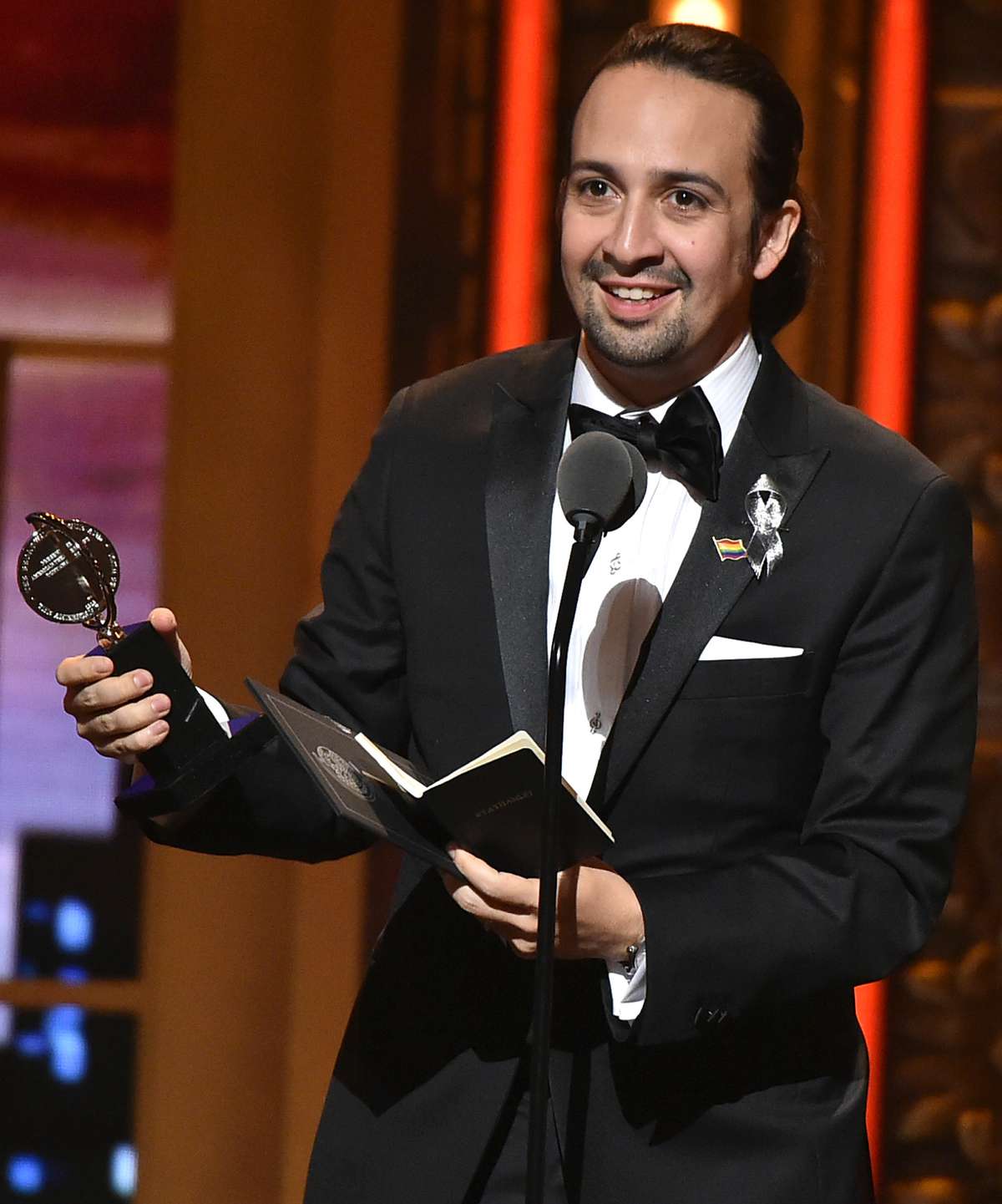 Songwriter Lin-Manuel Miranda accepts the award for Best Book of A Musical for 'Hamilton' onstage during the 70th Annual Tony Awards at The Beacon Theatre on June 12, 2016 in New York City.