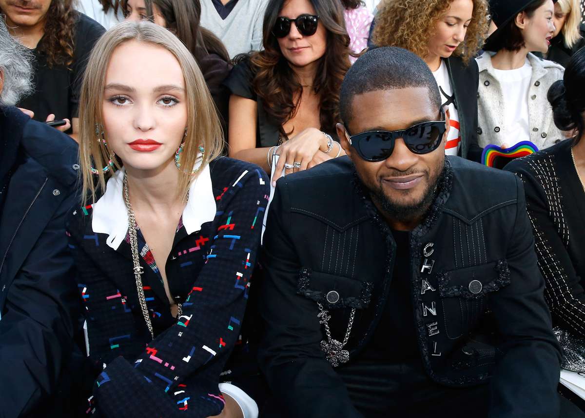 PARIS, FRANCE - OCTOBER 04:  (L-R)  Lily-Rose Depp and Usher attend the Chanel show as part of the Paris Fashion Week Womenswear  Spring/Summer 2017  on October 4, 2016 in Paris, France.  (Photo by Bertrand Rindoff Petroff/Getty Images)