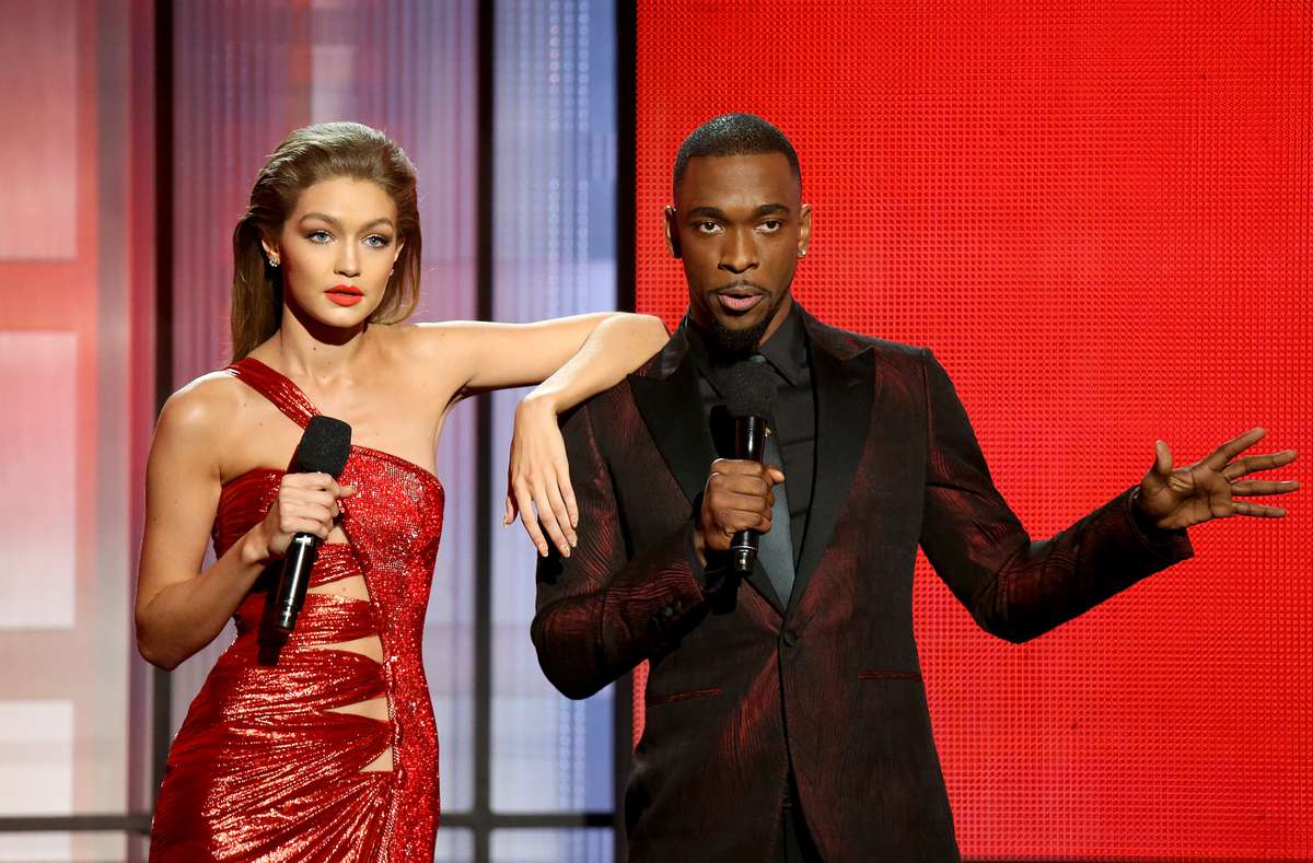 Hosts Gigi Hadid (L) and Jay Pharoah speak onstage during the 2016 American Music Awards held at Microsoft Theater on November 20, 2016 in Los Angeles, California.
