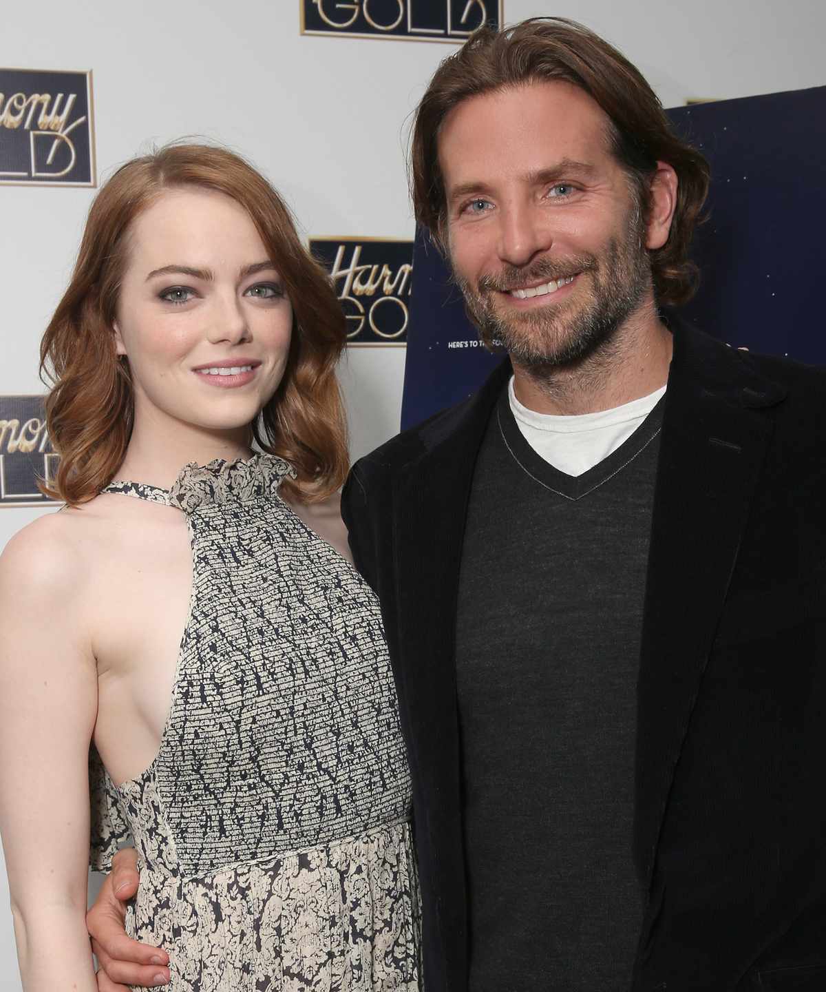Bradley Cooper (right) hosts a Special Screening of Lionsgate's LA LA LAND with Emma Stone on November 21, 2016 in Los Angeles, California.