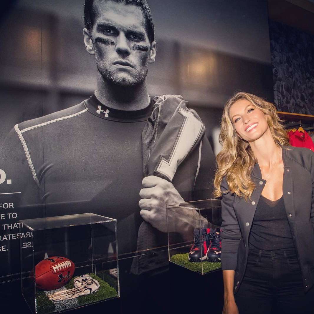 When She Posed Next to a Giant Poster of His Face