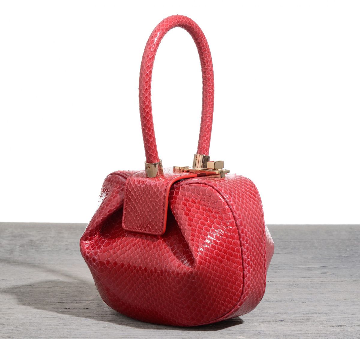 Demi bag in red snake, $2,495; at Net-a-porter.com.
