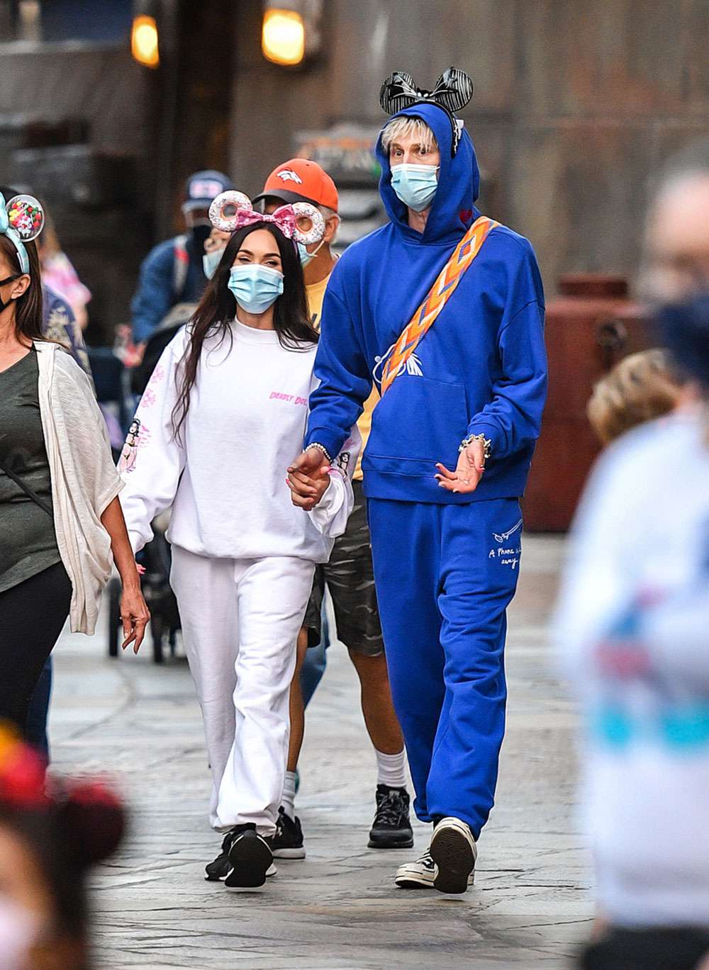 EXCLUSIVE: Megan Fox and Boyfriend Machine Gun Kelly Visit Disneyland with her parents and family in Anaheim, CA