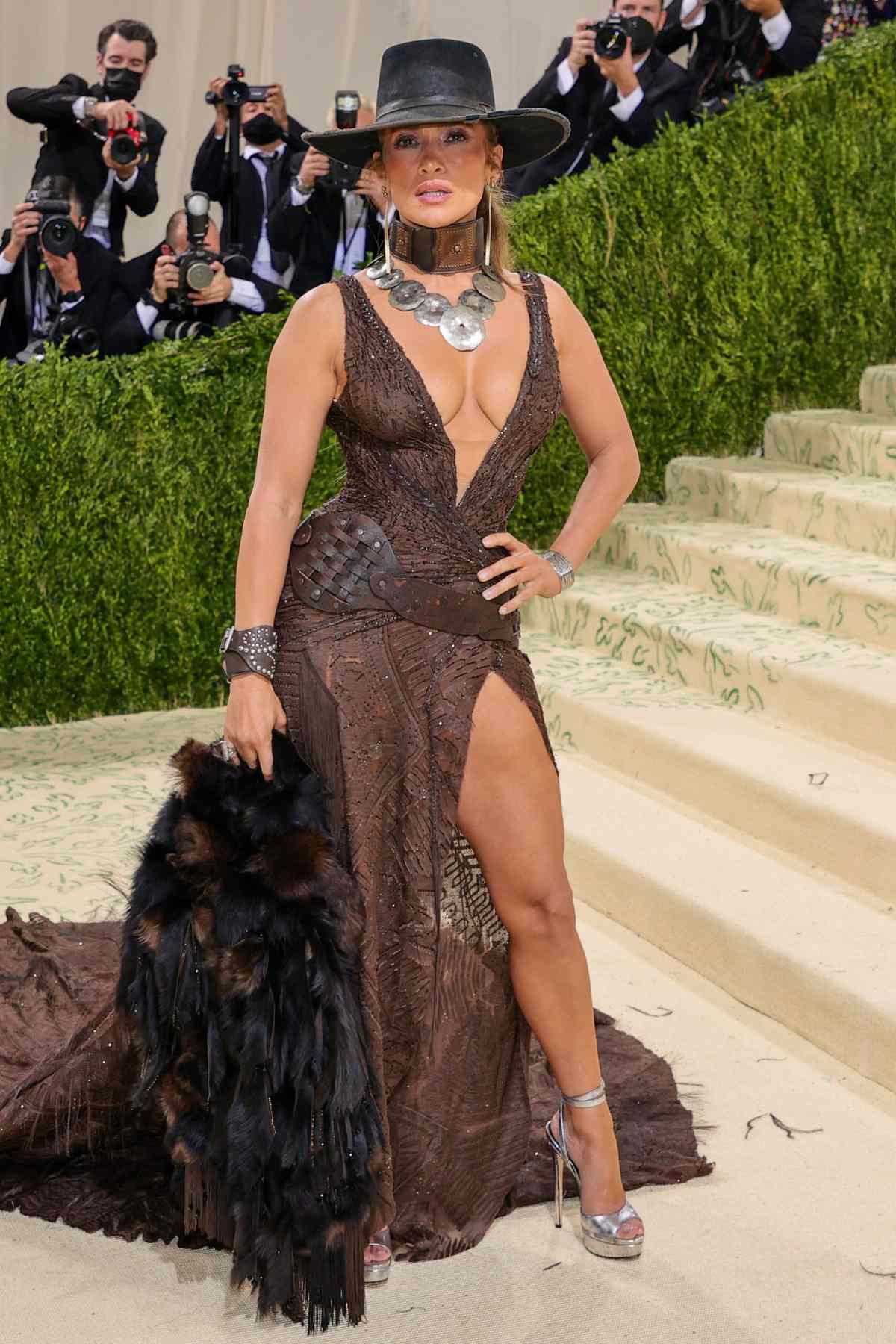 Jennifer Lopez Wore a Cowboy Hat With a Low-Cut, Thigh-Slit Gown at the 2021 Met Gala | InStyle
