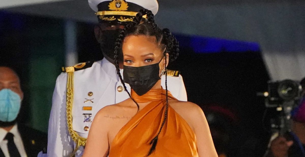 Rihanna Goes Braless in a Burnt Orange Silk Halter Gown