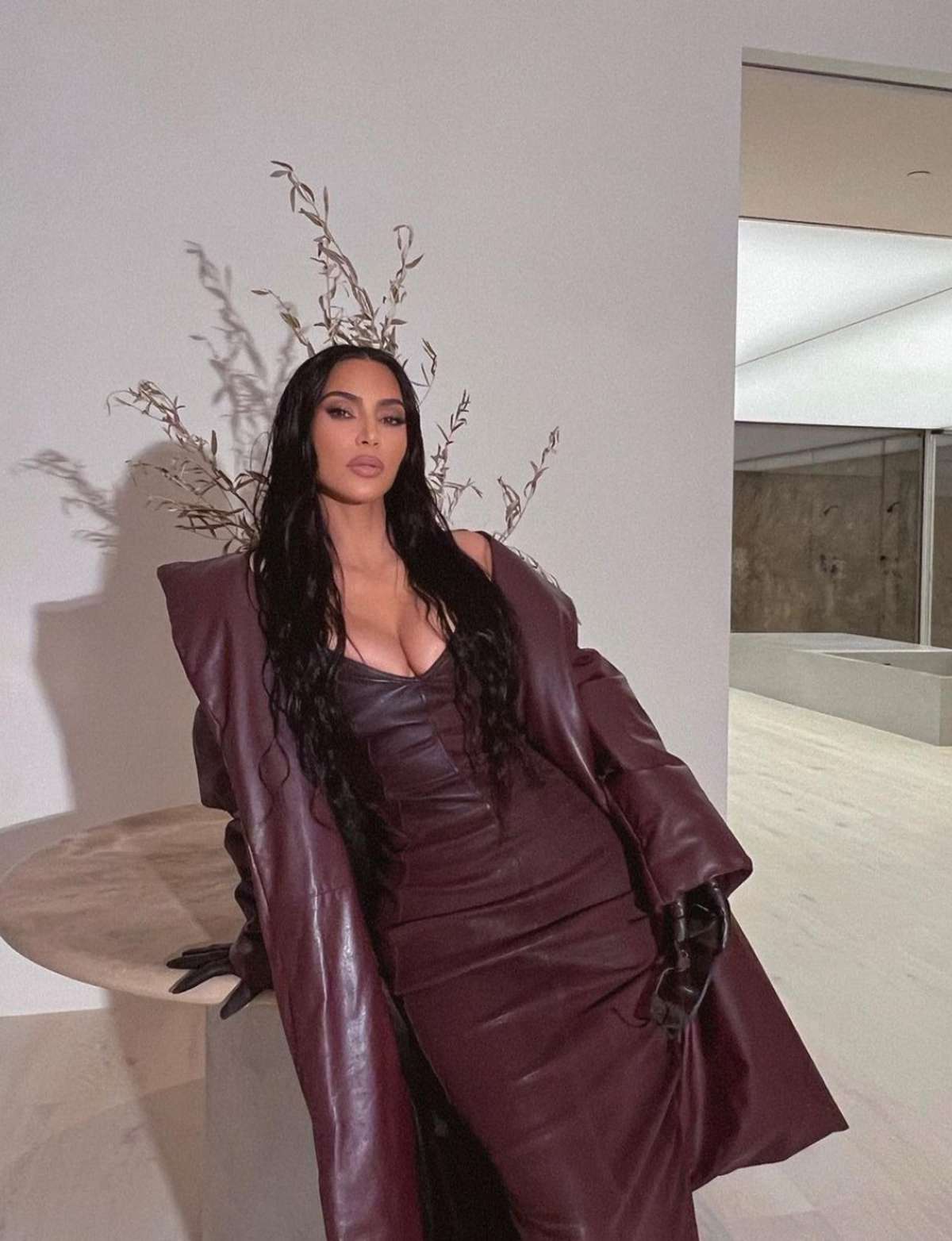 Kim Kardashian Maroon Leather Dress and Coat Instagram