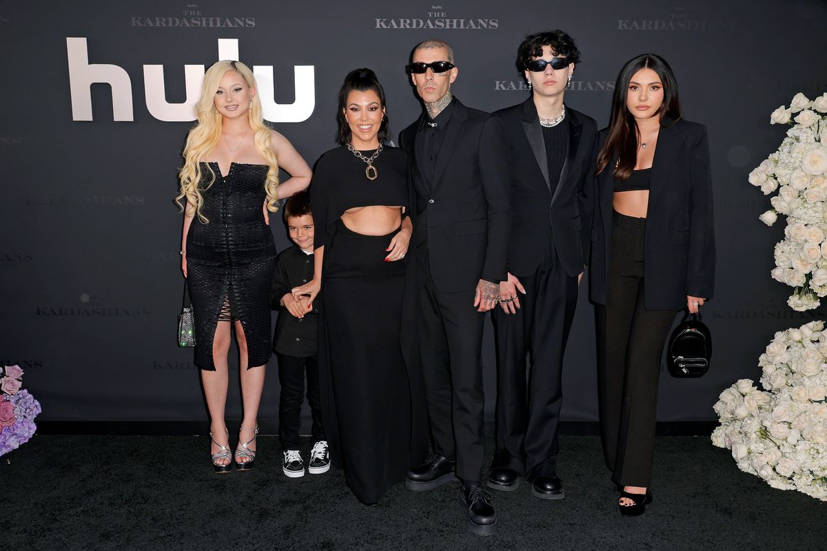 Kourtney Kardashian Black Cutout Dress and Travis Barker Blended Family The Kardashians Premiere