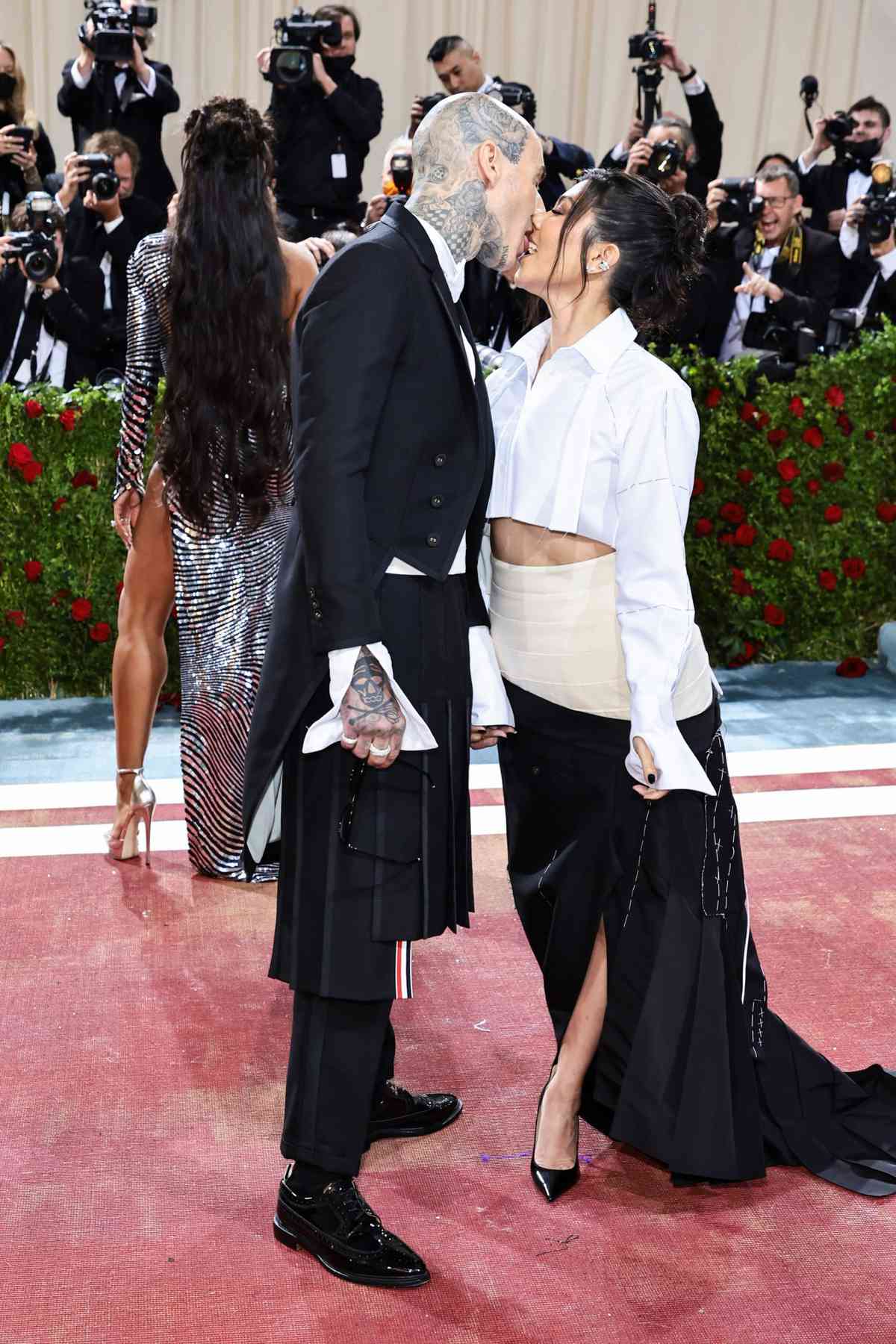 Kourtney Kardashian Travis Barker kissing on Met Gala Red carpet