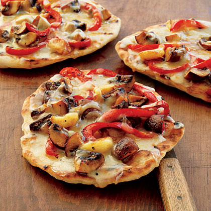 Pizza with Mushrooms, Pepers, Garlic, and Smoked Mozzarella