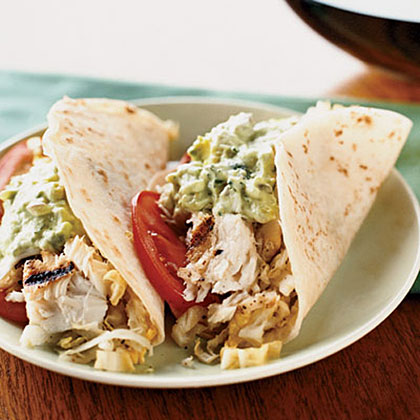 Fish Tacos with Creamy Lime Guacamole and Cabbage Slaw
