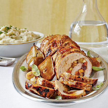 Spicy Fruit-Stuffed Pork Loin with Roasted Pears and Onions 