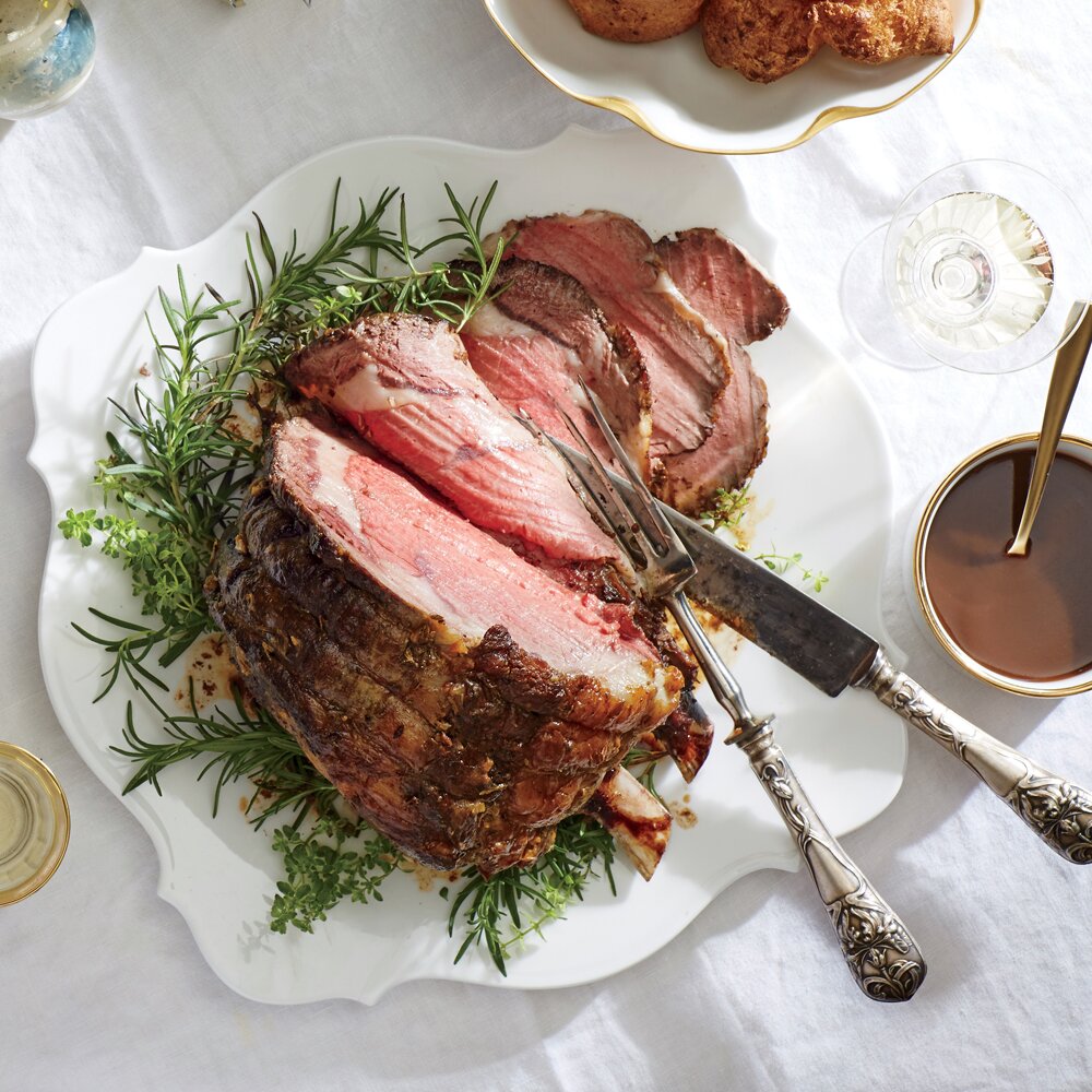 image?url=https%3A%2F%2Fstatic.onecms.io%2Fwp content%2Fuploads%2Fsites%2F19%2F2015%2F10%2F26%2Fherb crusted roast beef yorkshire pudding red wine jus ck