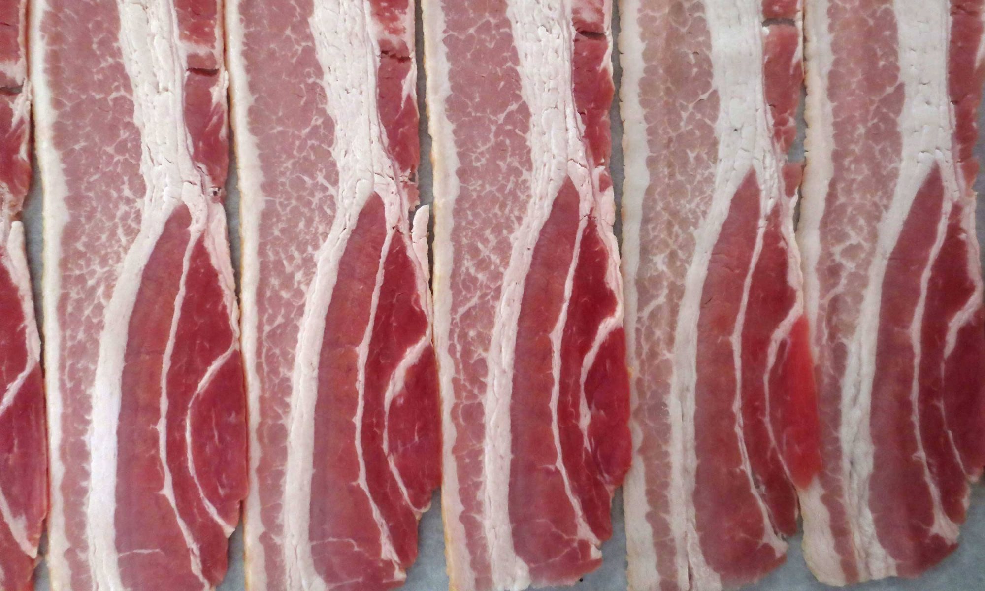 EC: Is Raw Bacon Safe to Eat?